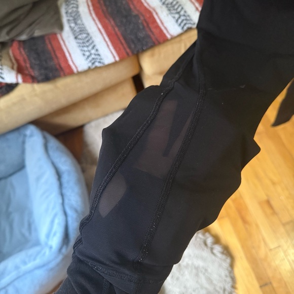 Black 25 inch lululemon leggings - sheer detailing - Picture 3 of 7